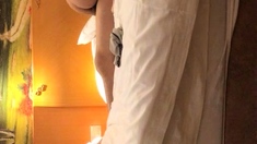 Cute amateur asian web cam girl playing with her toy
