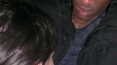 Outdoors interracial blowjob