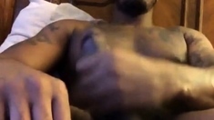 Black Man Masturbates And Cums On Camera