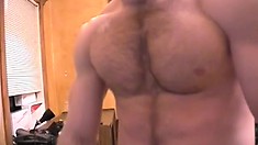 Muscular man with a nice happy trail strokes his big fat cock