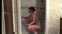 Hot milf cleaning the shower showing her ass